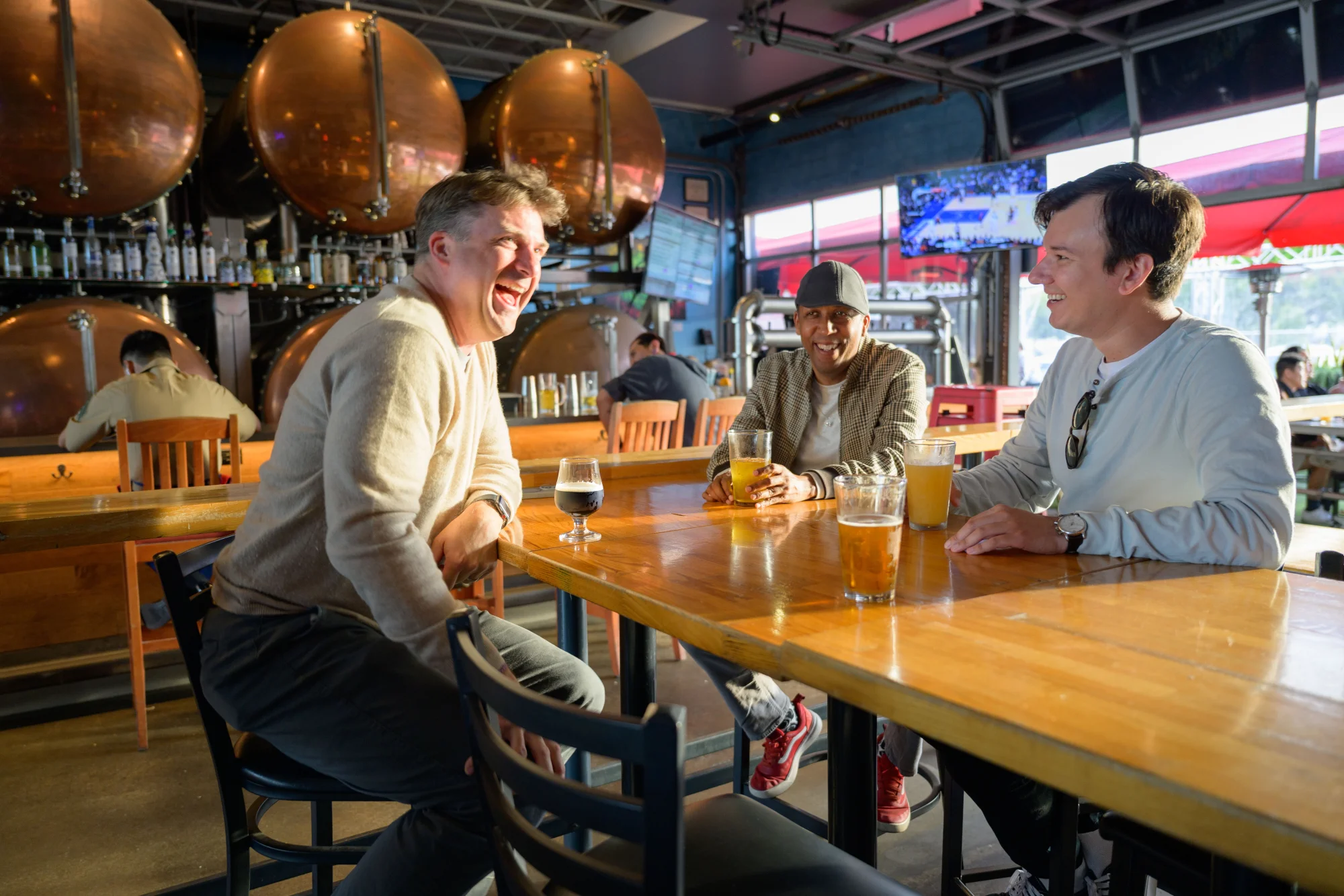 Men enjoying local brewery near Gable House